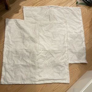 NIB  two white throw pillow covers.